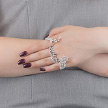 Необычное и очень нарядное серебряное кольцо- браслет с узором из крупных фианитов