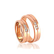 Обручальное кольцо из розового золота с тремя бриллиантами