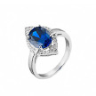 Серебряное кольцо с овальным синим камнем по центу и фианитами