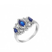 Яркое серебряное кольцо со вставками из крупных синих и россыпи белых фианитов