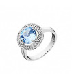 Оригинальное серебряное кольцо с цирконами и голубым топазом круглой огранки